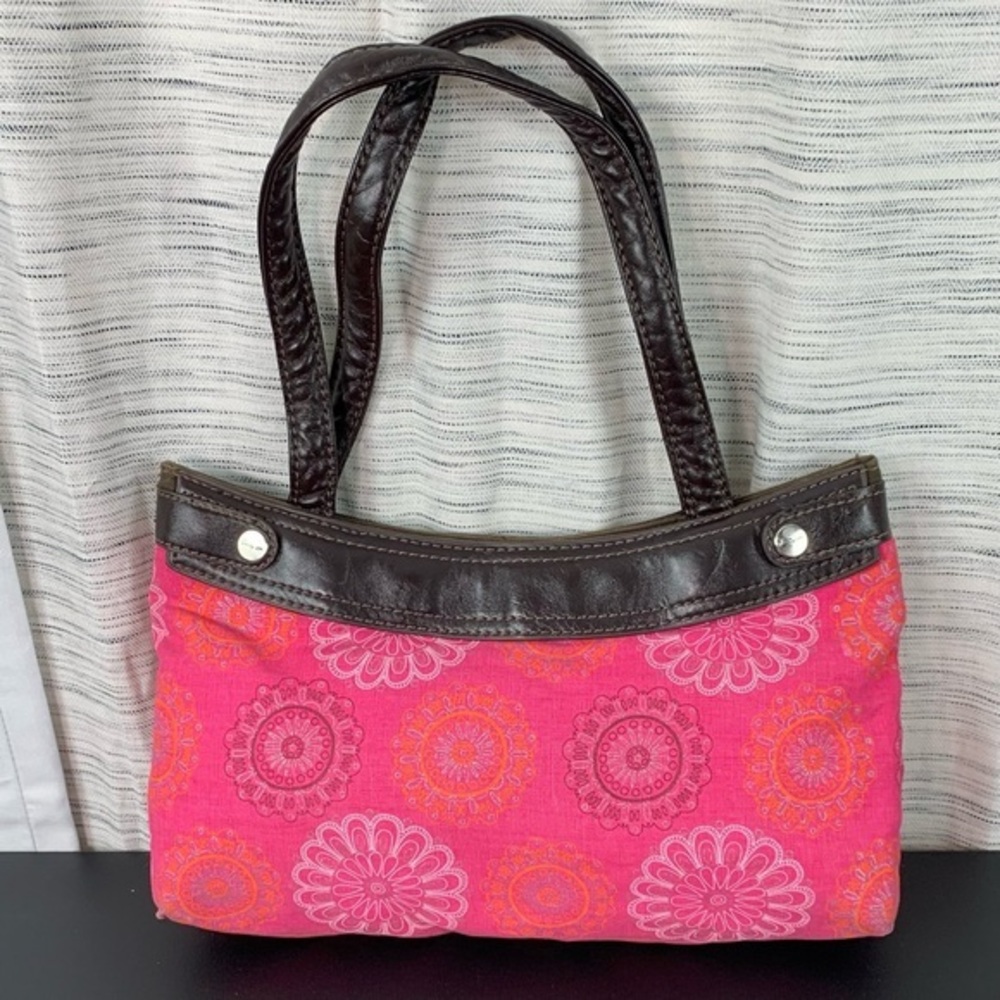 Thirty-one pink circle pattern handbag.